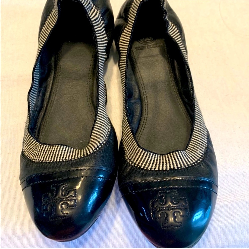 Black patent leather Tory Burch flats.
